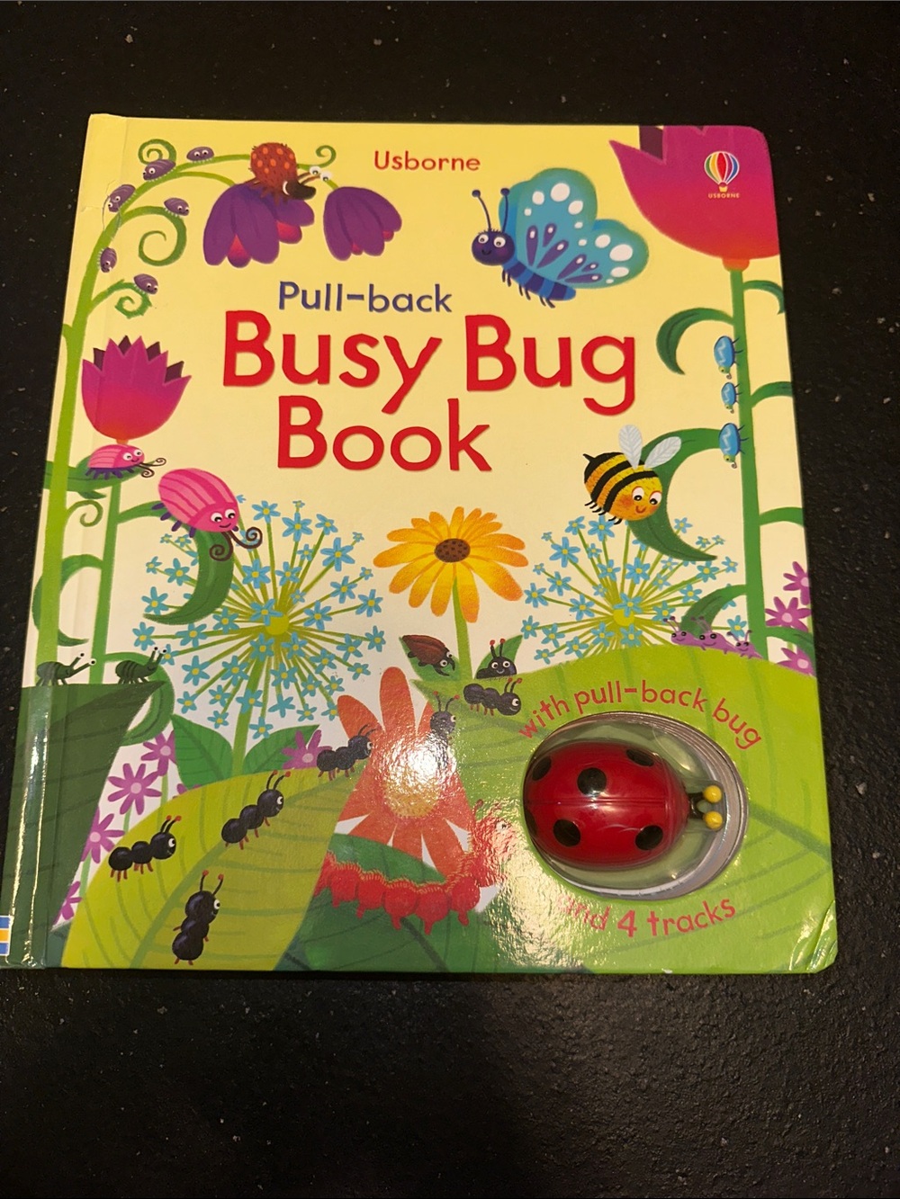 Usborne Pull-back Busy Bug Board Book with Red Pull-Back Ladybug